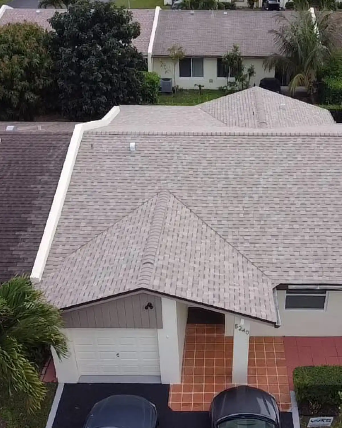 Weather Recovery Solutions team performing a full architectural shingle roof replacement in the Las Verdes community of Delray Beach, Palm Beach County.